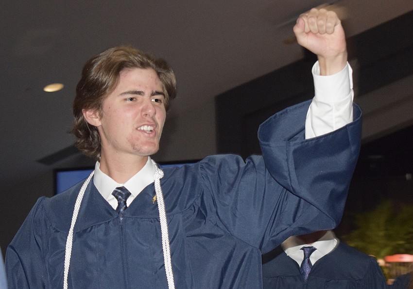 Out-of-Door Academy's Aiden Smith cheers as he sees his family.