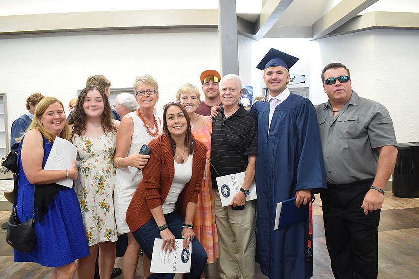 Out-of-Door Academy graduate Jack Hobson celebrates with his family.
