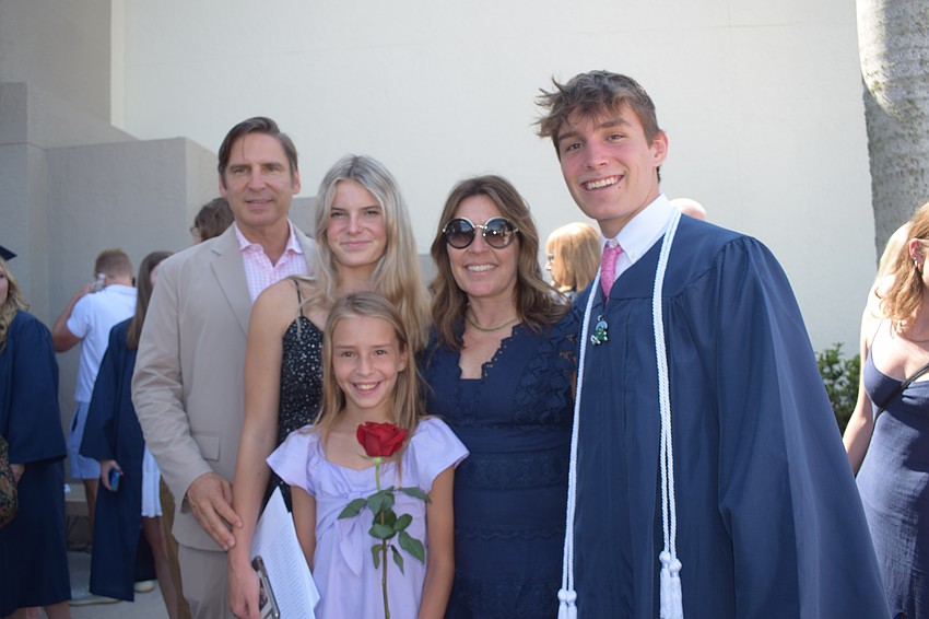 Brett Arslaner, Elle Arslaner, Bianca Arslaner and Tricia Arslaner celebrate with Out-of-Door Academy graduate Sloan Arslaner.