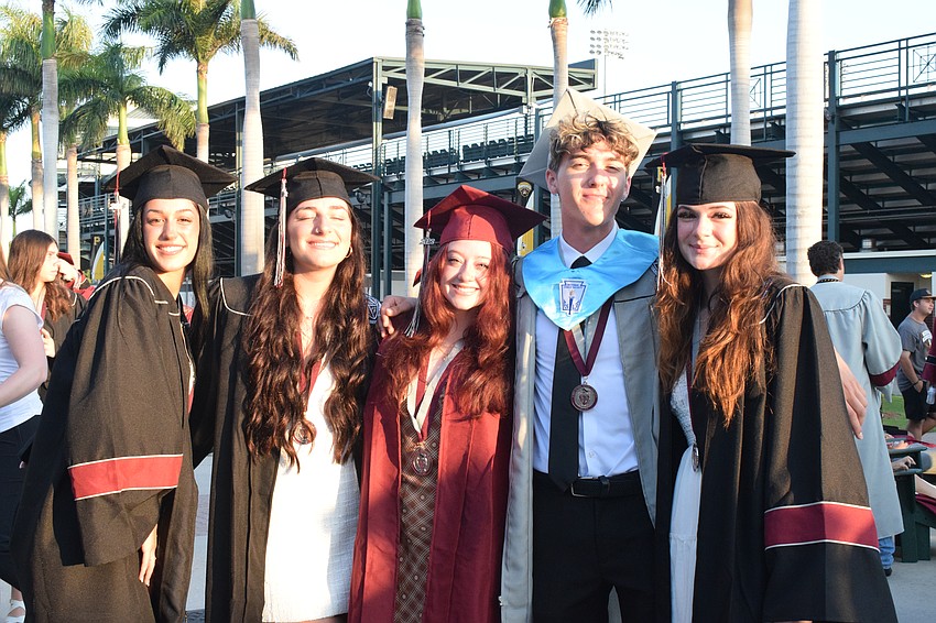 Braden River High School's Rebecca Lima, Chloe Simmons, Mea Adkins, Dominic Berardi and Audrey Cummins are thrilled to graduate.