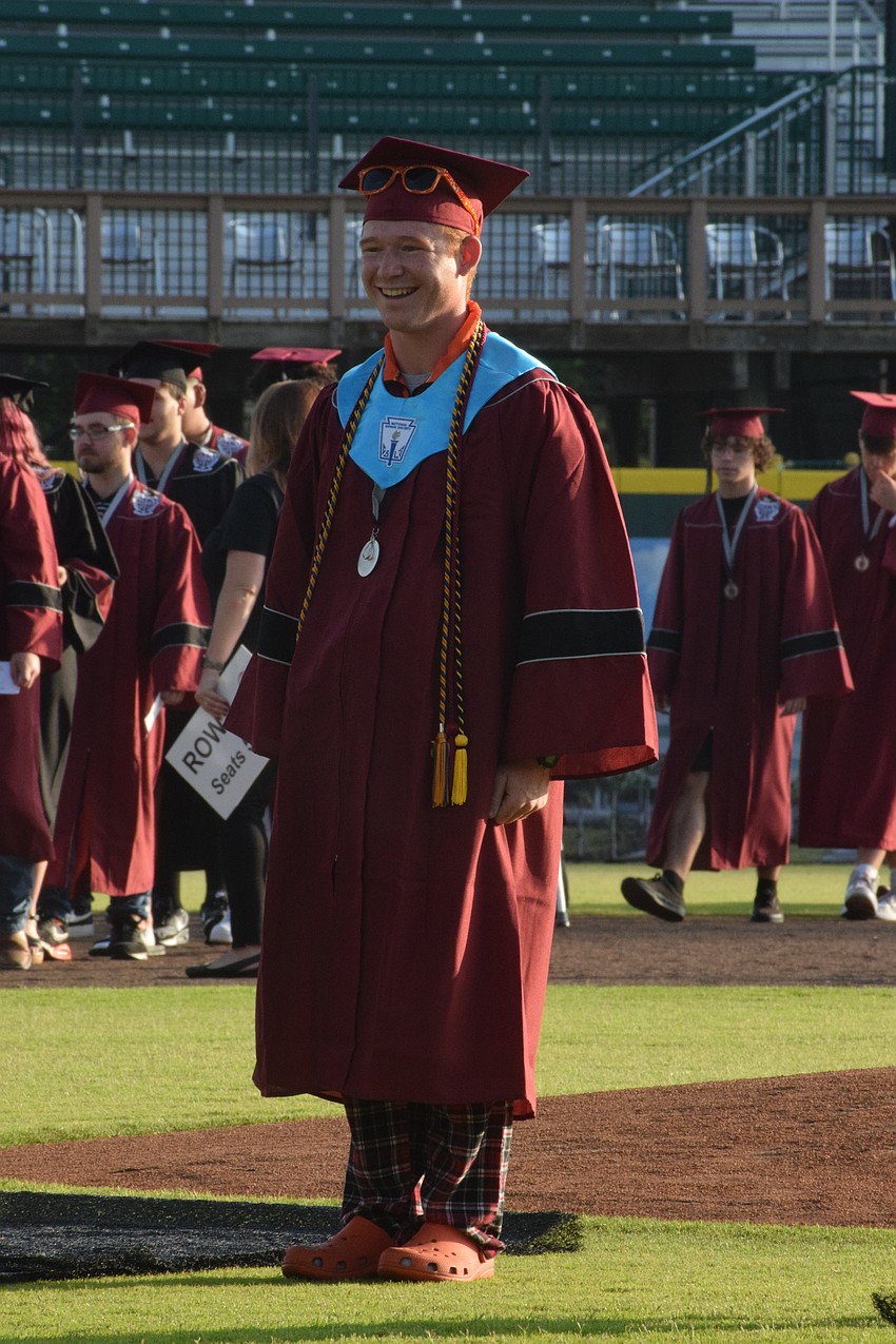 Braden River High School's Stuart Macaulay waits for the ceremony to begin.