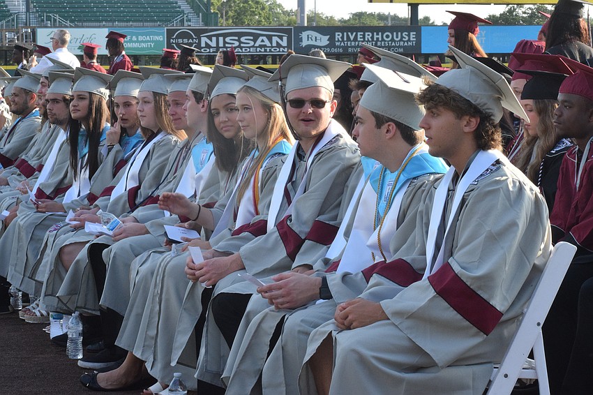 Braden River High School graduates in the top 10% of their class wear silver robes.