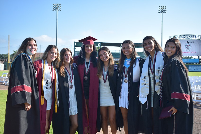 Braden River High School graduates celebrate after receiving their diplomas.