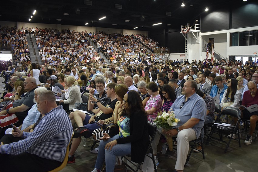 The crowd fills the auditorium.