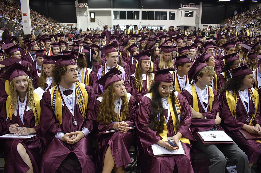 Students fill the auditorium.