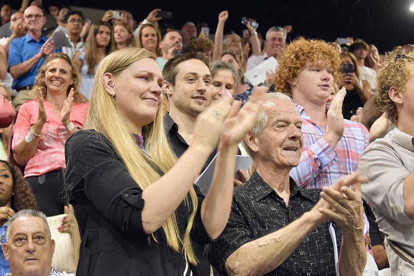 Laura Christophel and Levon Christophel applaud the graduation of Dahmia Westfall, their daughter and granddaughter, respectively.