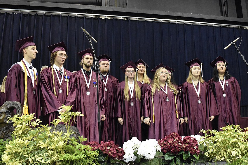Members of the Riverview High School chorus sing the Star Spangled Banner.