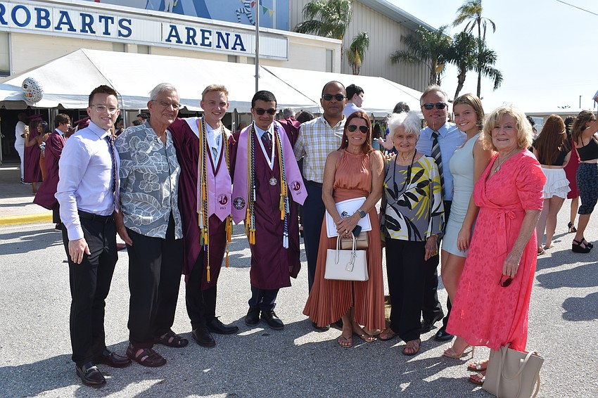 Alec and Milton Kruk, graduates Brian Kruk and Sherif Abdou, Abdelhamid Abdon, Lori, Stephanie, Dennis, and Danielle Kruk, and Theresa Govier