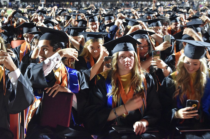 Graduates move their tassels to the left side.