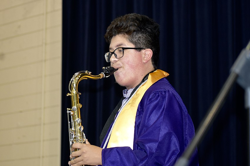 Juan Zambrano plays saxophone with the band Fourcast.
