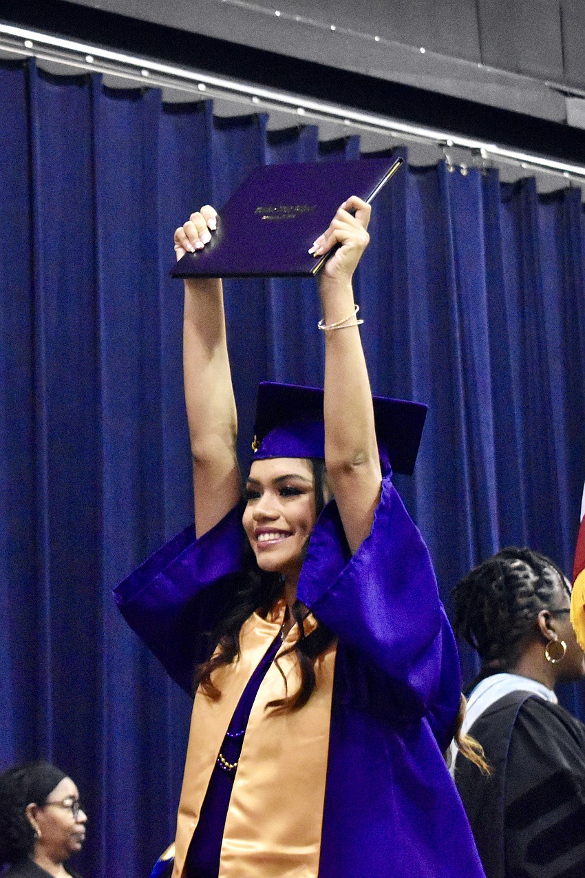 Mariah Lattore celebrates graduating.