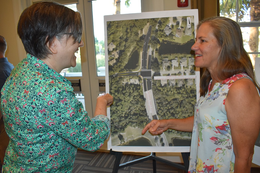 Summerfield's Nina Antonetti and Karen Dewey discuss Manatee County's road project at Lakewood Ranch Boulevard and Clubhouse Drive on May 22 at Lakewood Ranch Town Hall.