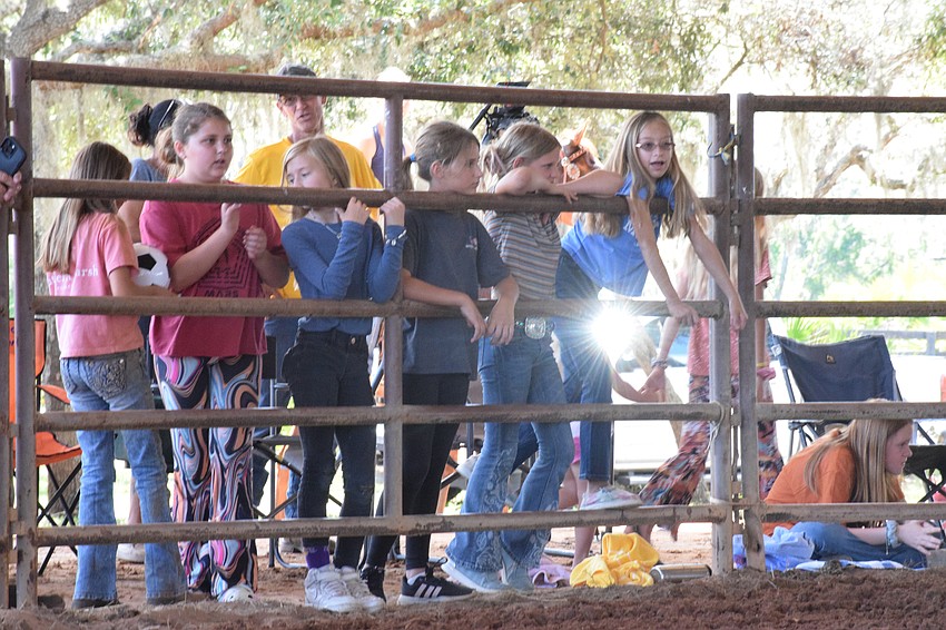 Myakka City Elementary School students watch and cheer on their classmates participating in the rodeo.