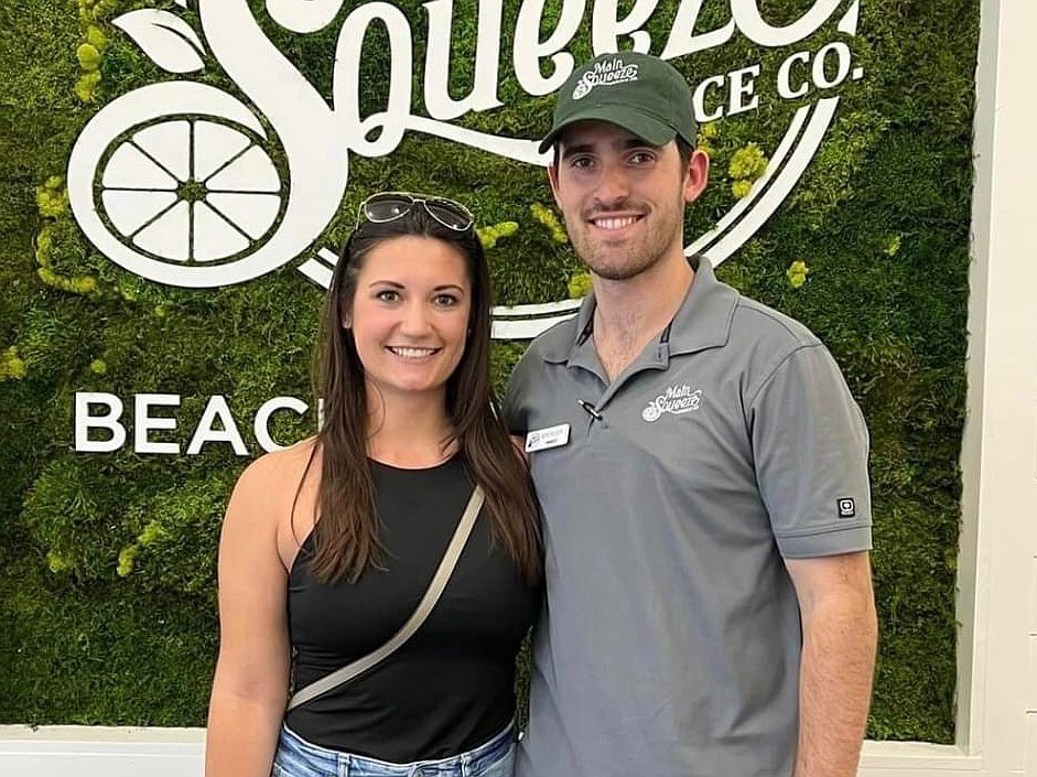 Spencer Turner, owner and operator of the two Main Squeeze Juice Co. franchise locations in Northeast Florida, and his fiancee, Kaitlin Stanton, in the new Main Squeeze store at 13546 Beach Blvd., Unit 1A, in Jacksonville.