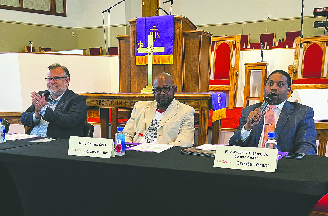 From left, Thom Liggett, operating partner at Performance Capital Partners; Irvin PeDro Cohen, executive director of LISC Jacksonville; and The Rev. Micah C.T. Sims, pastor at Grant Memorial AME Church, spoke April 1 about plans to build Gilchrist Crossing.