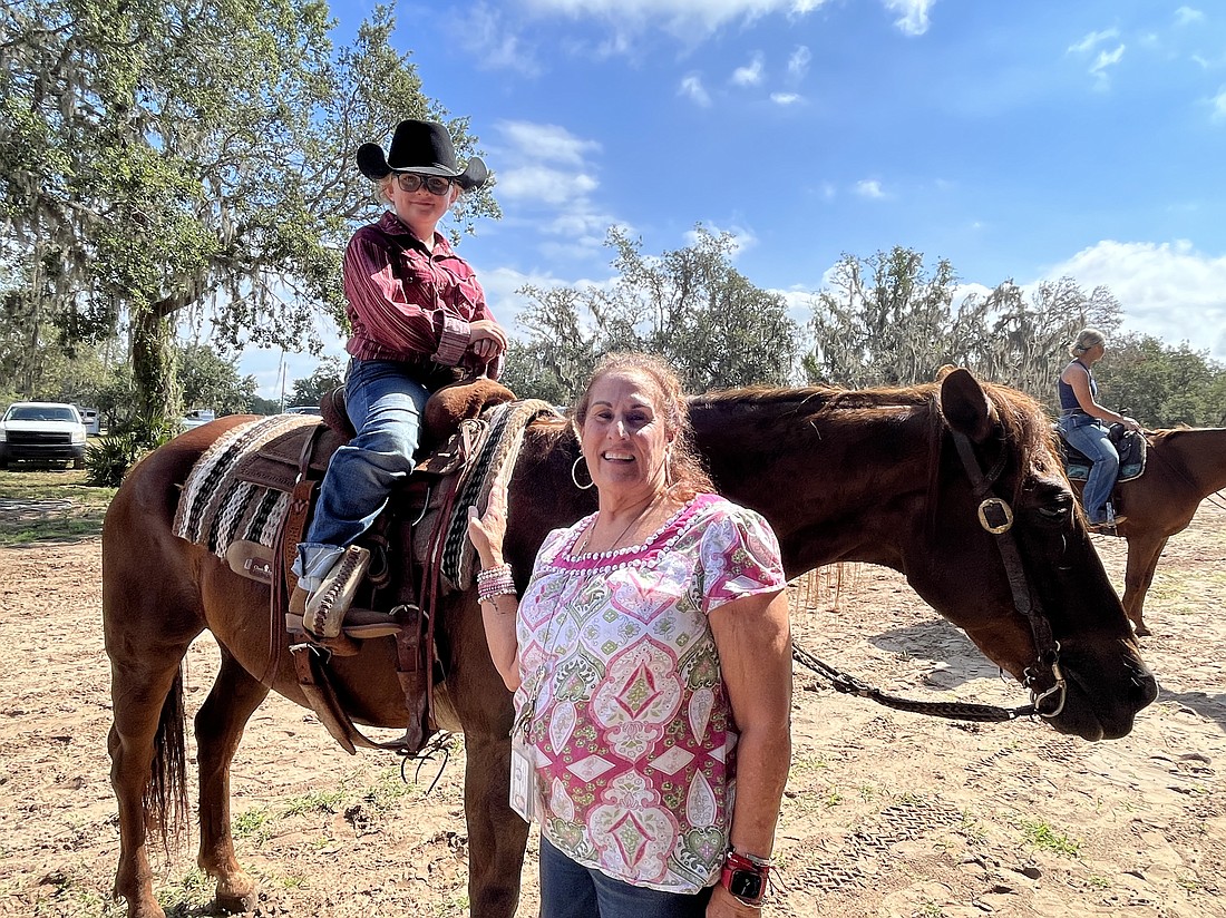 Myakka City Elementary School second grader Marshyll Scott has the chance to show her teacher, Jackie Blue, her rodeo skills.