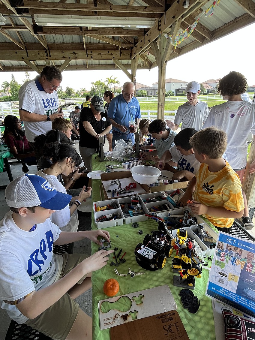 Lakewood Ranch Preparatory Academy students work on STEM activities from State College of Florida Coding Academy.