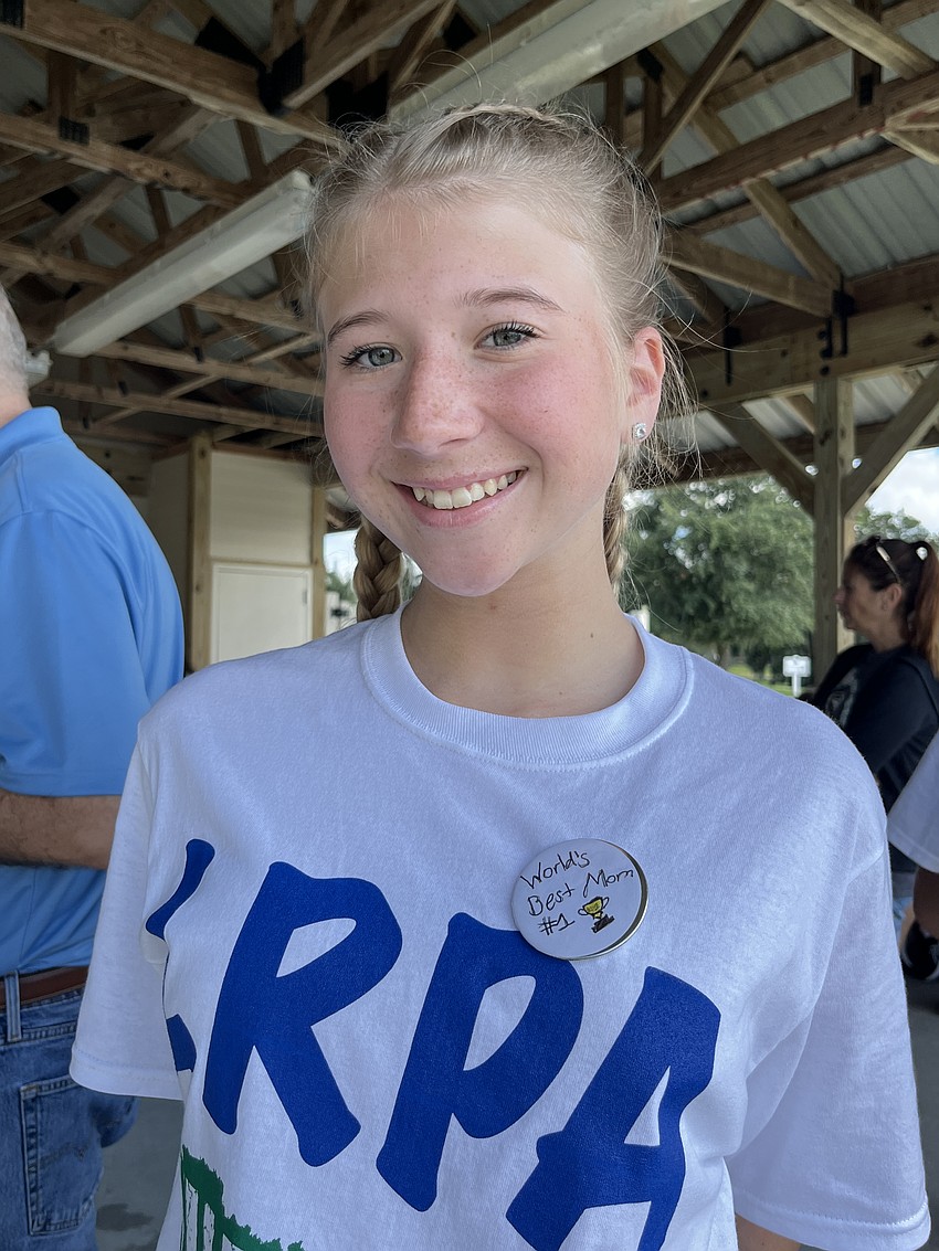 Lakewood Ranch Preparatory Academy freshman Courtney Henderson makes a button calling herself the 