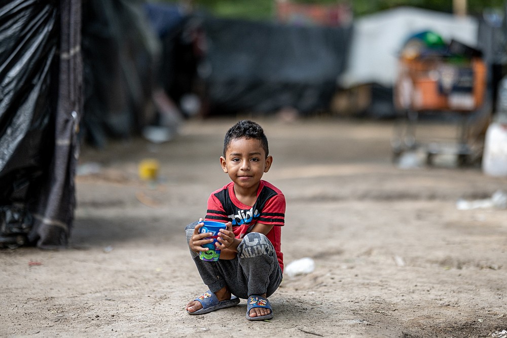 A child in the migrant camp in Matamoros, Mexico, in May of 2023.