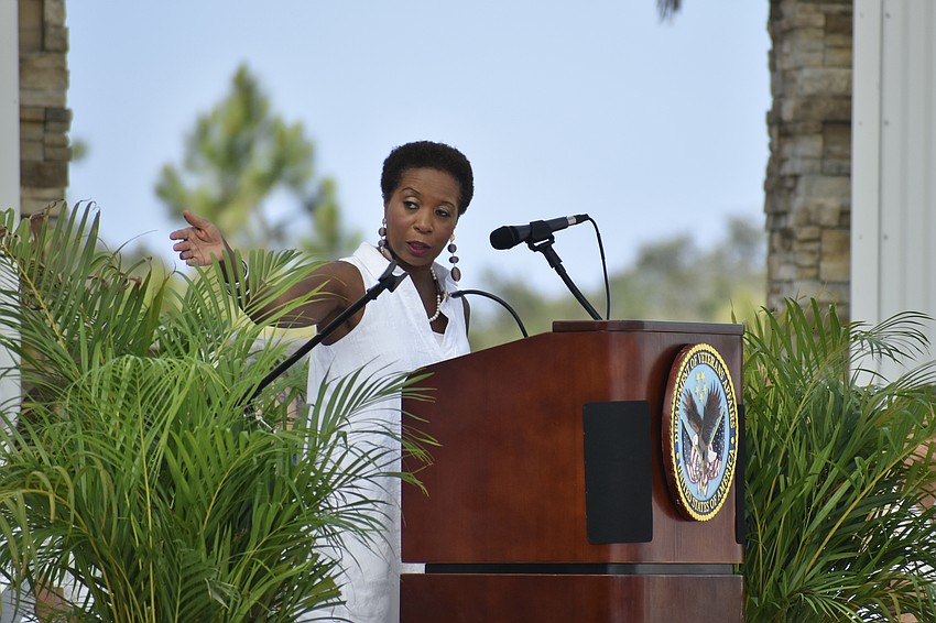 Tribute Chair Renée James Gilmore addresses the audience.