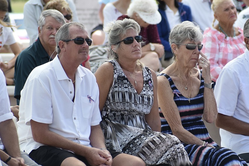 Joel and Deb Watson, and Fran Perkins, watch the event.