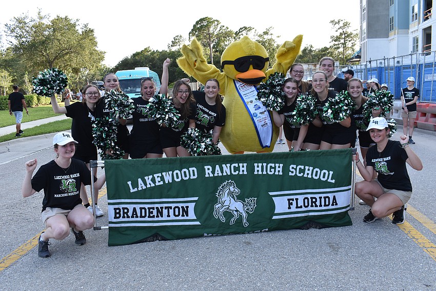Members of the Lakewood Ranch High Color Guard had a little fun before the start of the parade.