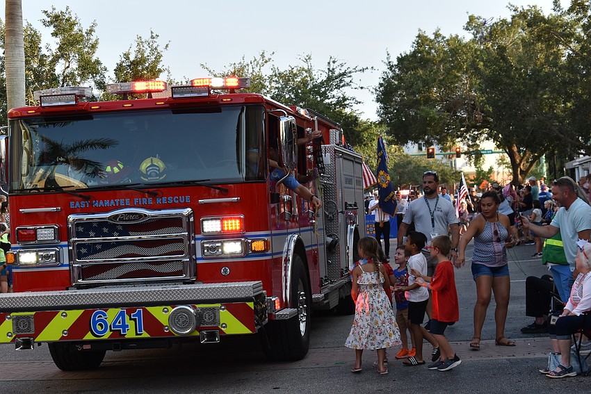An East Manatee Fire Rescue truck started the parade and tossed candy to the kids along the way.