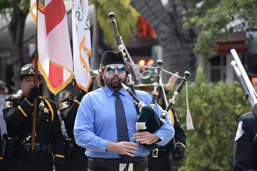 Sarasota Military Academy graduate Micah Adams played bagpipes at the parade and ceremony.
