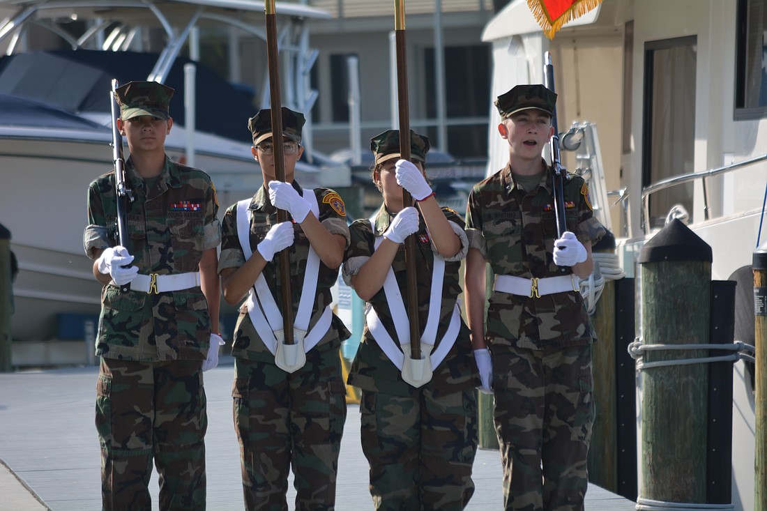 Young Marines from the Imagine School post the colors.