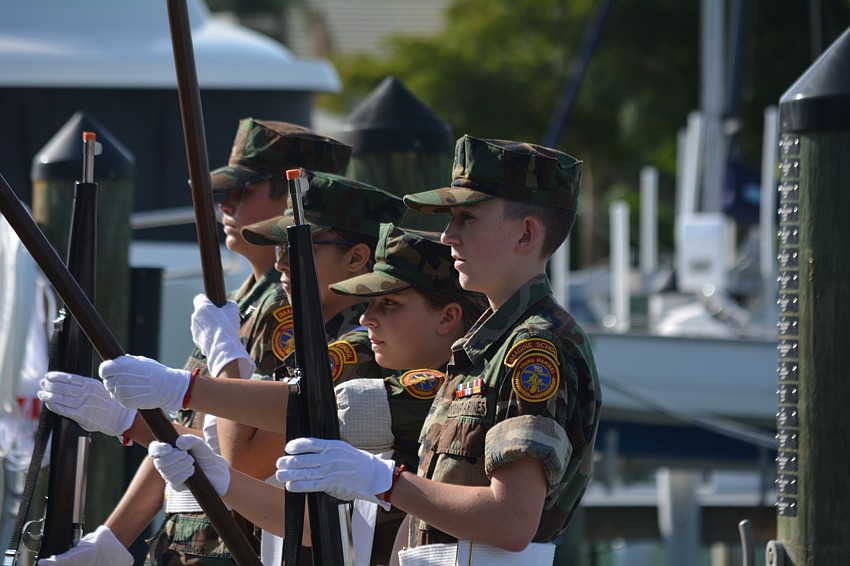 Young Marines from the Imagine School post the colors
