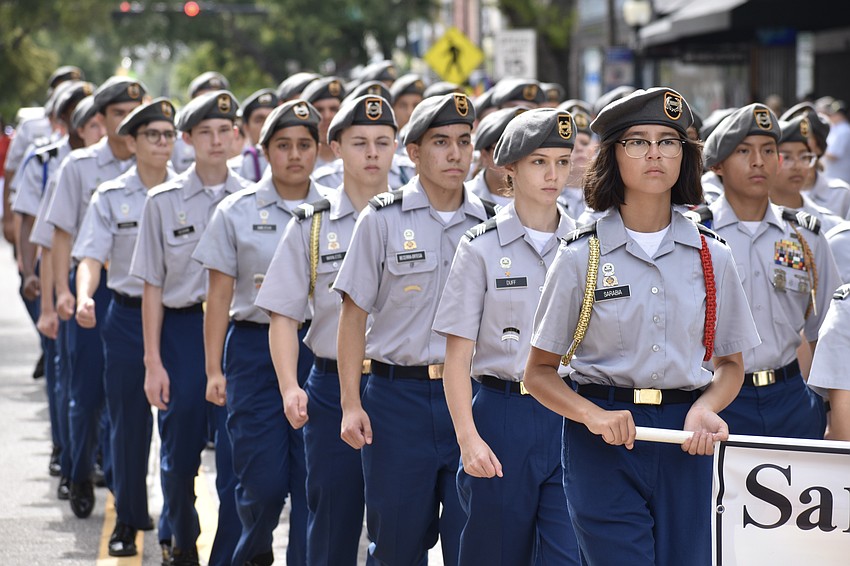 Members of the Sarasota Military Academy Army JROTC Eagle Regiment march in the parade.