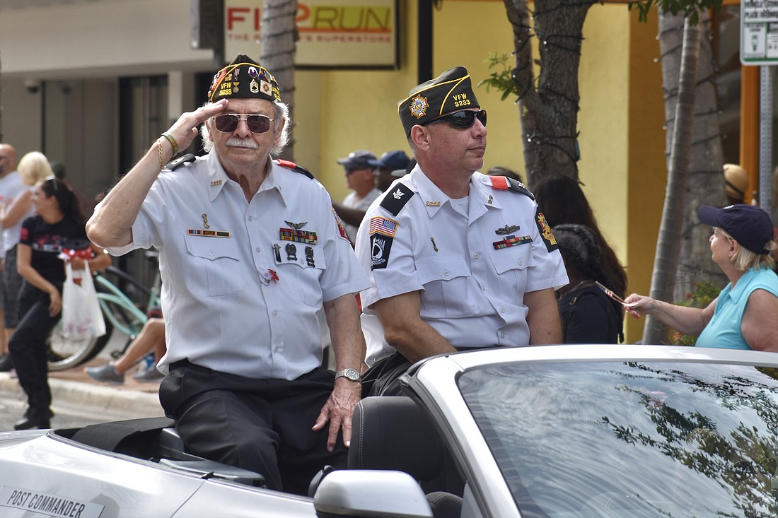 David Bonci and Commander Ron Evans of Veterans of Foreign Wars Sunshine Post 3233 greet the crowds lining Main Street on May 29, 2023, during the Memorial Day parade.