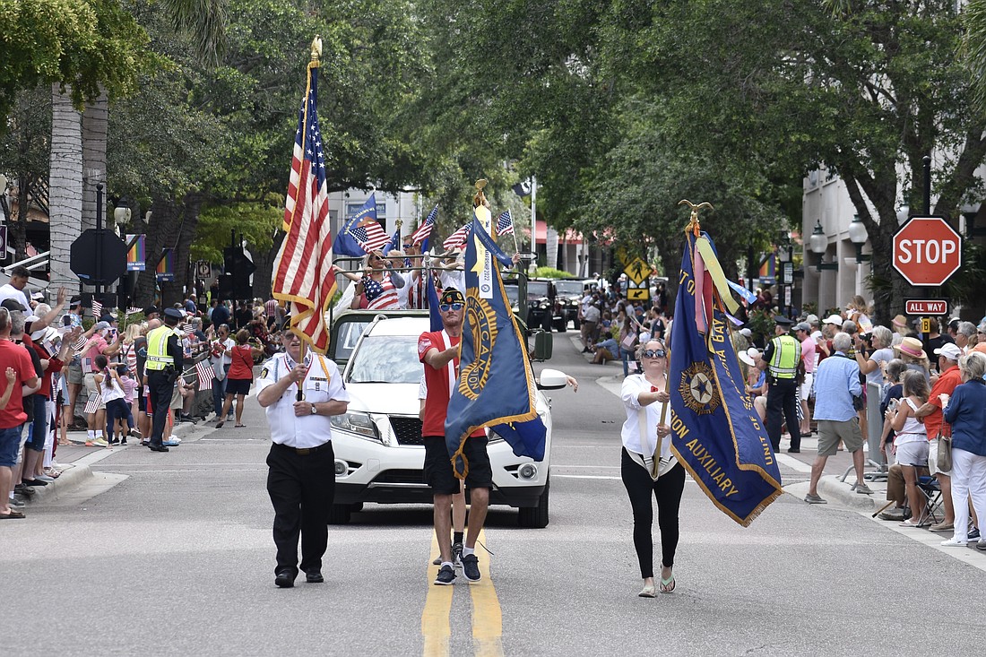 Members of the American Legion Unit of Sarasota Bay Post. No. 30 make their way down Main Street during the Memorial Day parade on May 29, 2023.