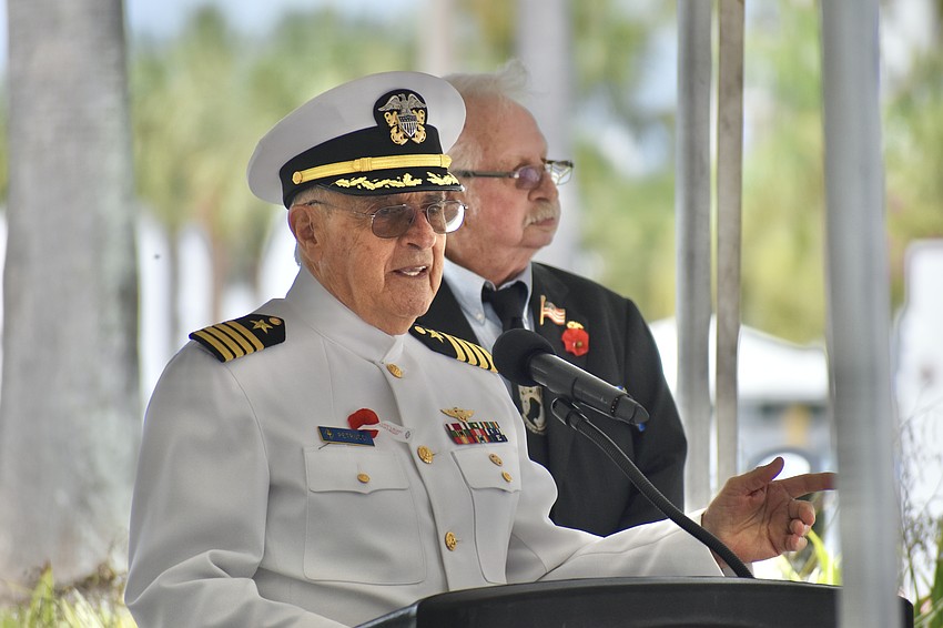 Keynote speaker Richard Petrucci, a former Navy pilot, instroduces himself alongside Sonny Bywaters of American Legion Post 30.