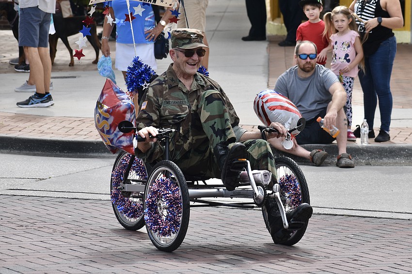 Vietnam veteran Col. James Weisensee makes his way down Main Street.
