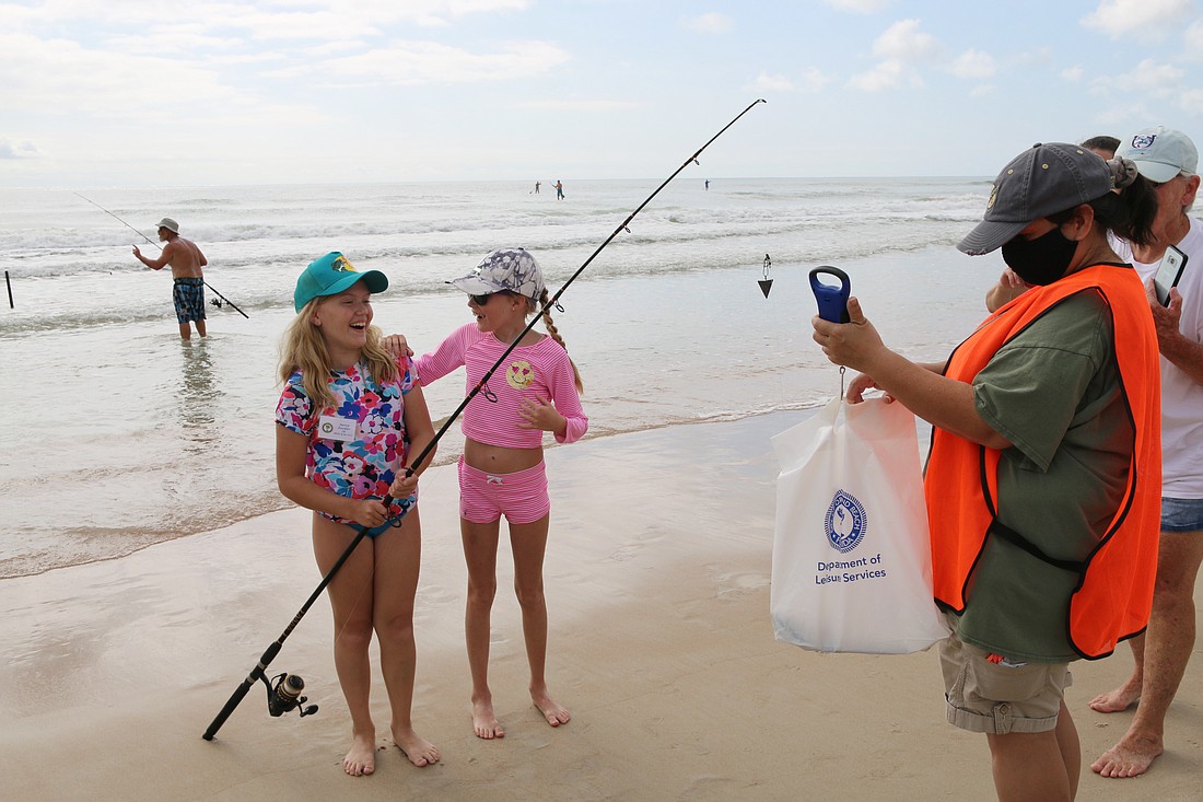 Aurora Zoeckler and Lily Garvey participate in a Reel in the Fun tournament in 2020. File photo by Jarleene Almenas