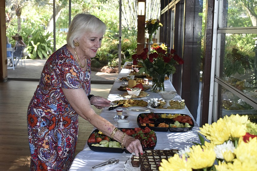 Sandy Slaminko reaches for a dessert.