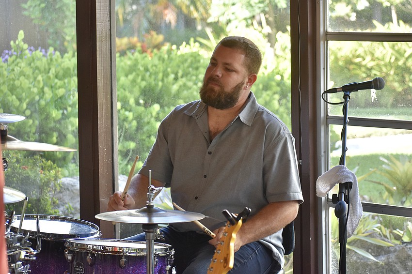 Drummer Derek Johnson plays at the event.