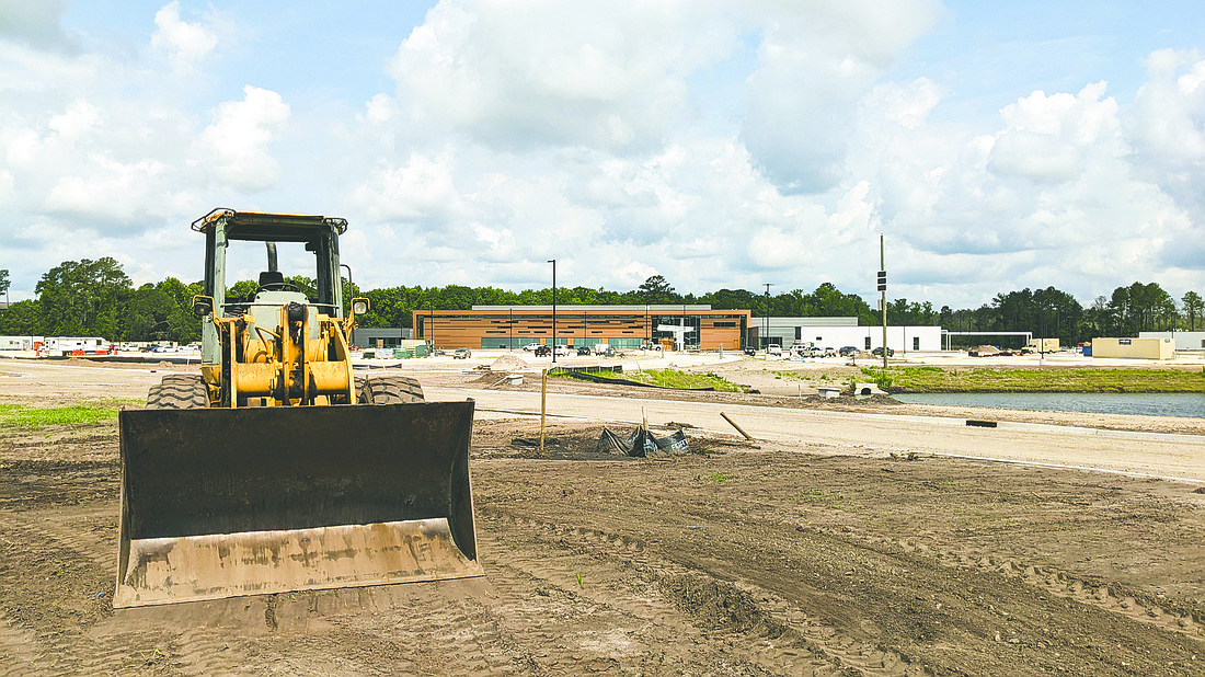 Construction crews work May 31 on the Department of Veterans Affairs outpatient clinic and domiciliary in North Jacksonville at 145 Heron Bay Road off Max Leggett Parkway.