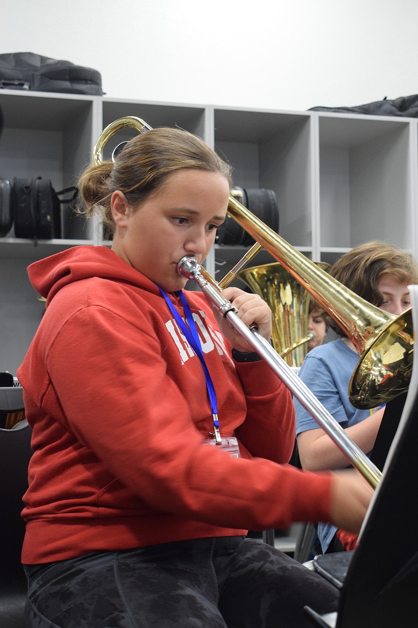 Charlotte Haverstick, a student at R. Dan Nolan Middle School, plays trombone with the beginner band.