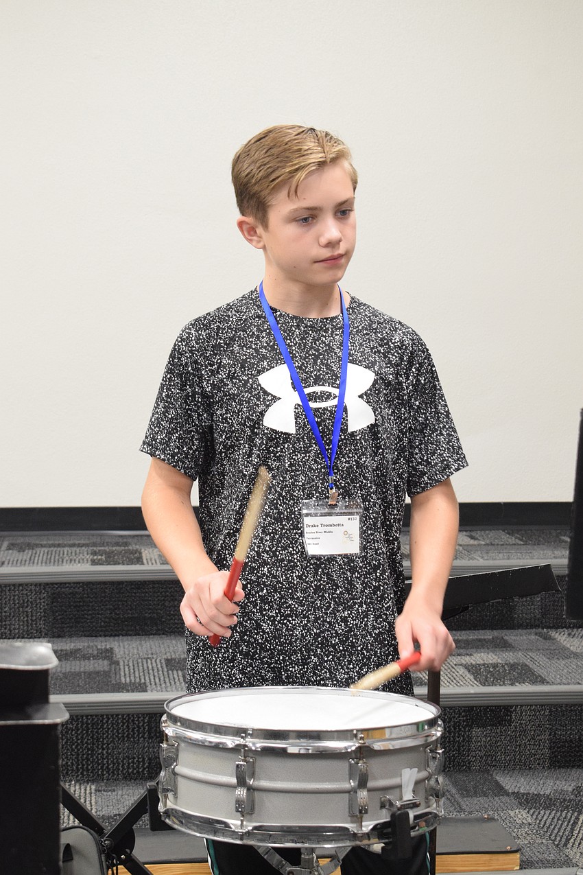 Drake Trombetta, a rising eighth grder at Braden River Middle School, has fun playing snare drum.