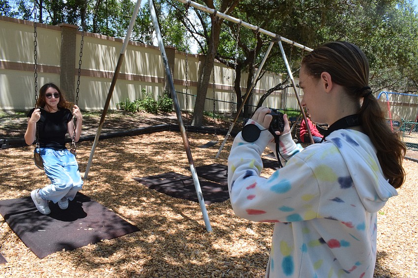 Sierra Owen and Maggie Blanton, who are rising eighth graders at Braden River Middle School, work on a digital arts assignment.
