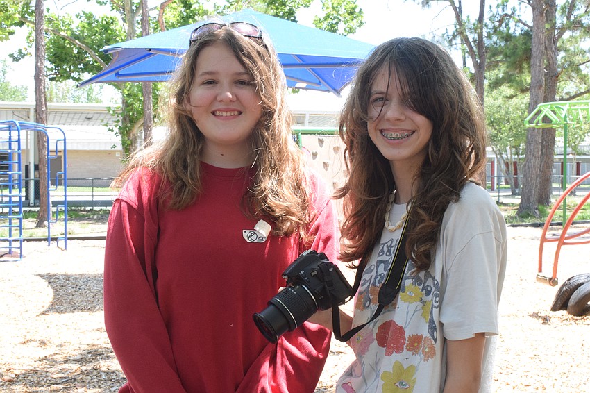 Remi Walker, a rising eighth grader at Buffalo Creek Middle School, and Emma Tarbet, a rising eighth grader at Dr. Mona Jain Middle School, love the digital arts portion of the art camp.