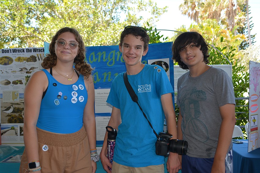 Addison Riesen, Brice Claypoole and Luke Lebel served mangrove honey cookies.