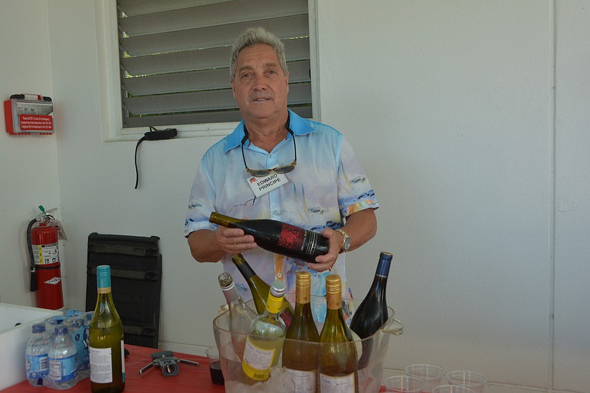 Edward Principe pours the drinks.