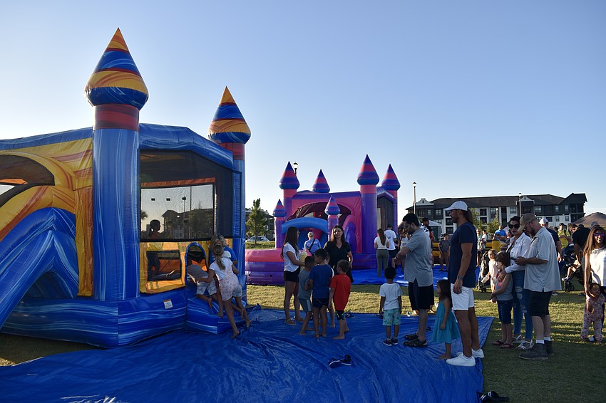 Bounce houses entertained the kids before the movie started.