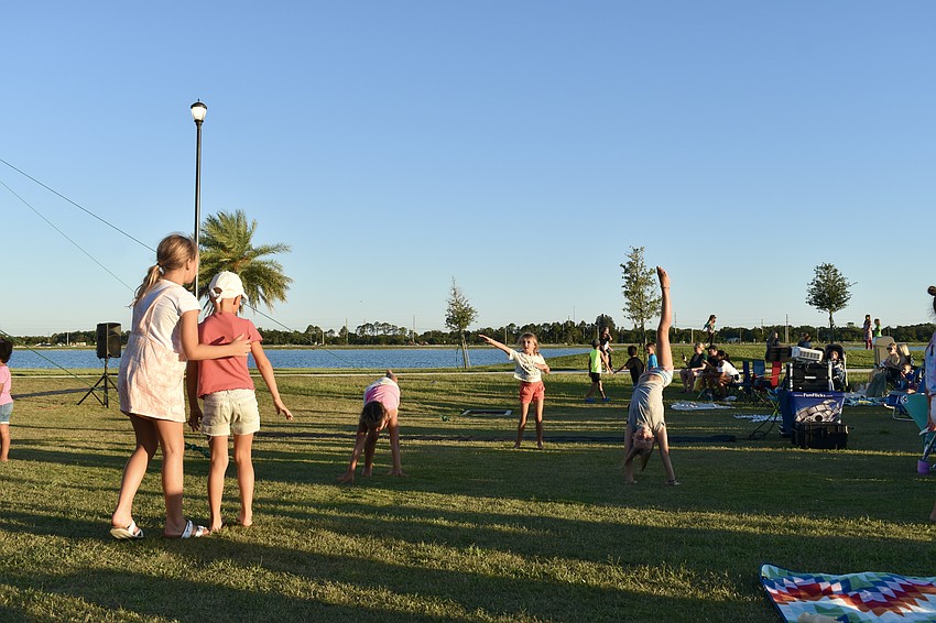 Cartwheels keep the kids busy before the movie starts.