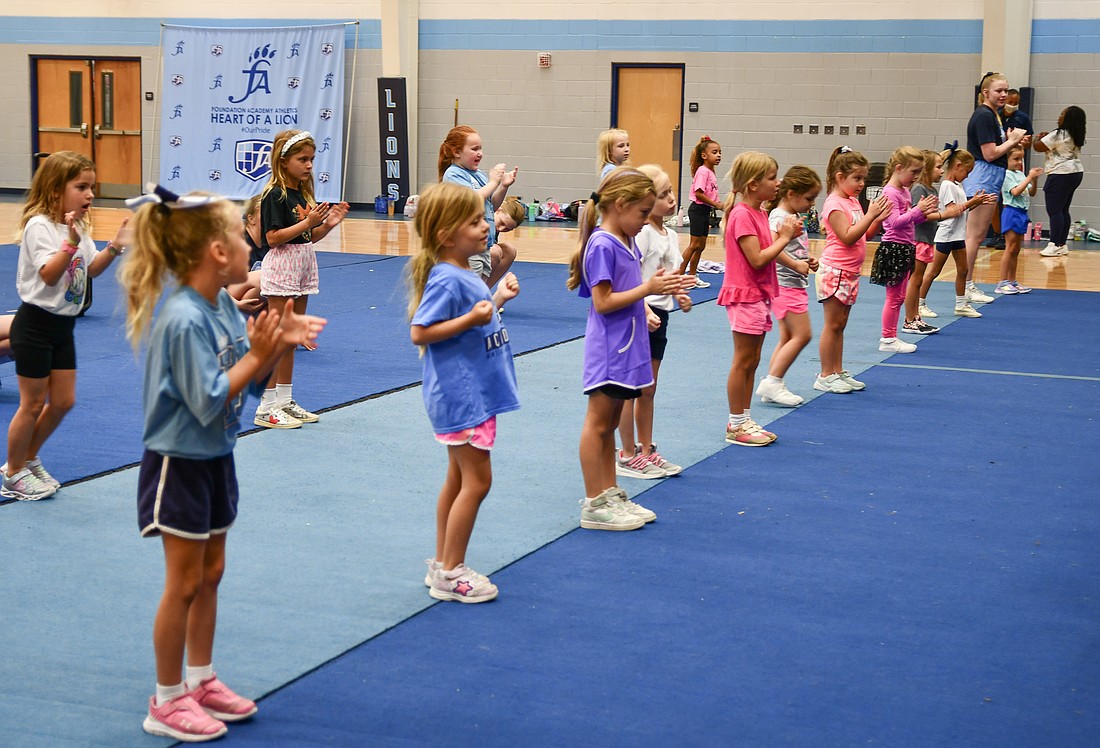 Photo Girls Lined Up Prior To Start Their Routines And Cheered Each