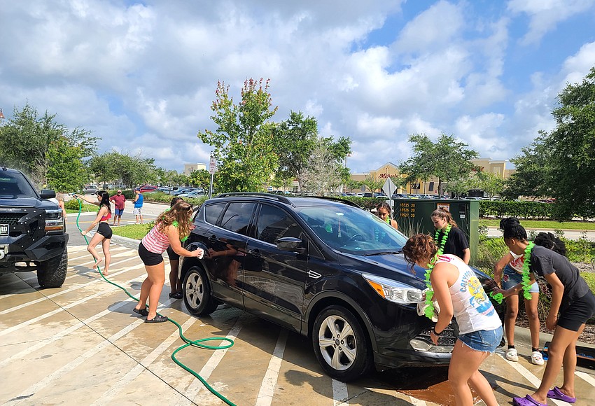 Twentyfive girls participate in Flagler Palm Coast Starlets car wash