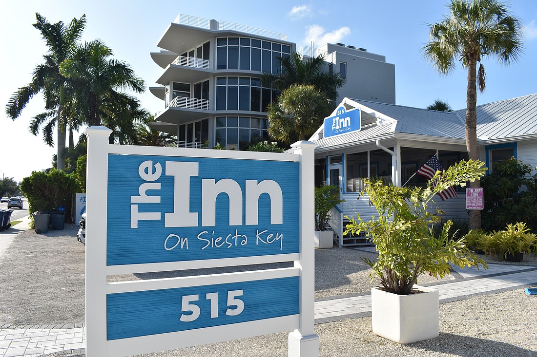 Owner Paige Hartmann has assumed some of the responsibility for cleaning The Inn on Siesta Key, amid staffing shortages.